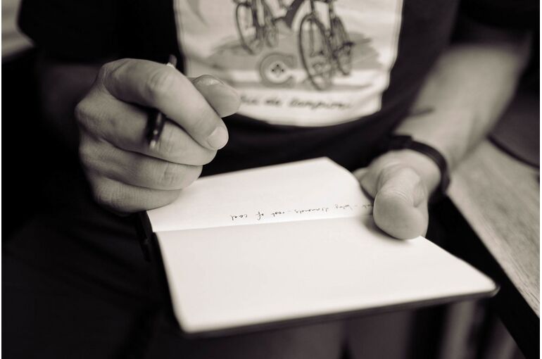 writing_hand_notes_holding_pen_fingers_document_text-595653
